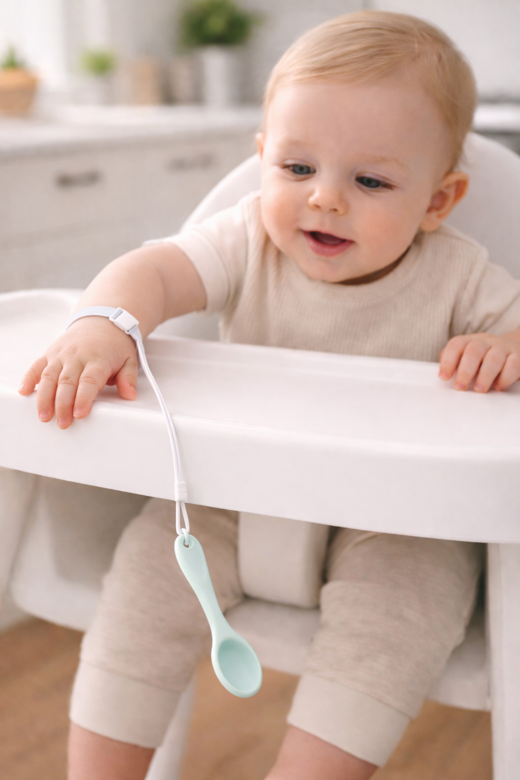 Baby using Tiny Tether in High Chair